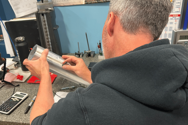 Design for Manufacturing review of a CNC machined part to improve efficiency and reduce machining costs at Rainhouse